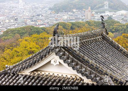 Himeji, Japan. Aerial view of the curved gables and rooftop tiles of the White Egret or Heron Castle, a castle complex from the Azuchi Momoyama period Stock Photo