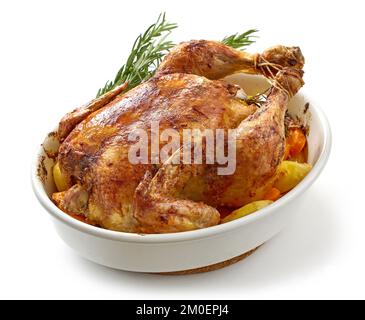 roasted chicken and vegetables isolated on white background Stock Photo