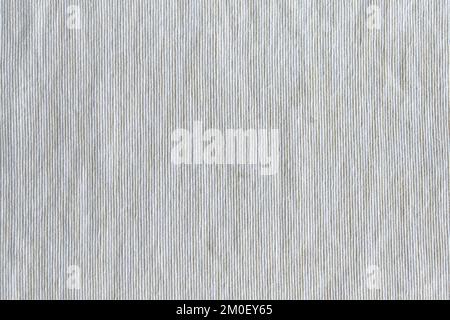 The texture of the light fabric of long strips close-up. Stock Photo