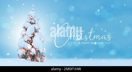 Merry Christmas card with natural snowy tree and Christmas lights. Stock Photo