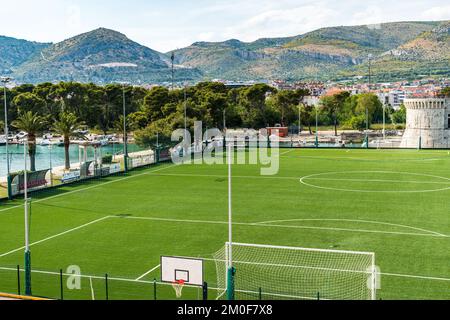 An aerial view of a green soccer field in Trogir town, Croatia Stock Photo