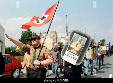 PA PHOTOS/POLFOTO - UK USE ONLY : FRA99-19980427-KOEGE, DENMARK:(FILES) An August 1997 file photo showing saluting German neo-nazis, members of the outlawed German Freedom Workers Party marching through the town of Koege, west of Copenhagen on the occasion of the Rudolf Hess March held to commemorate the 10th anniversary of Hitler's deputy Hess's death. The spectre of right-wing politics raised is head again in German yesterday in the Saxony-Anhalt state elections where the German People's Union won a hefty 12.9 percent of the vote, causing ripples throughout Germany since it is the first time Stock Photo