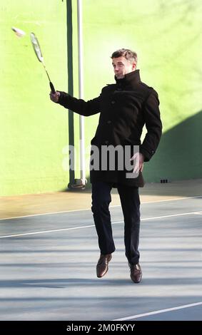 Crown Prince Frederik, plays badminton with Chinese player Bao Chunlai during an event to promote Danish company's corporate social responsibility in China at the Danish Embassy in Beijing, Saturday, Dec. 8, 2012. PHOTOGRAPHER MICHAEL STUB / POLFOTO Stock Photo