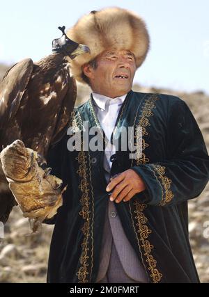 Kazakstan 2002. The last eagle hunters in the world. In Kazakstan a man is a man when he can ride a horse and hunt with an eagle. They have done it the same way for the last 4000 years. Stock Photo