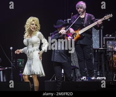 Dolly Parton performing during a concert at the Forum Copenhagen in Frederiksberg, Denmark Stock Photo