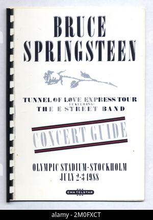 Bruce Springsteen Tunnel Of Love Express Tour 1988. Booklet and flyer produced by the tour promoters EMA Telstar for three concerts at Olympic Stadion in Stockholm in July 1988 and June 1989.  Produced for the musicians, road crew, technicians and anyone involved in staging the show.  It contains loads of detailed information on contacts, security, hotels, as well as exact timing details of the event, plus local places to eat out and even a map of the area. Stock Photo