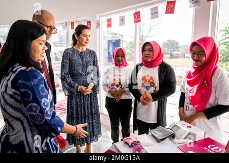 Crown Princess Mary visits the coffee shop Peacumber Coffee, which houses a mobile health clinic together with Danish Minister of Development Cooperation Rasmus Prehn and UNFPA Executive Director Natalia Kanem in Yogyakarta, Central Java on Thursday December 3rd 2019. Her Royal Highness Crown Princess Mary, Danish Minister of Development Cooperation Rasmus Prehn and UNFPA Executive Director Natalia Kanem visits Indonesia from the 2nd-4th of December 2019. In particular focusing on reproductive health and on the celebration of the 70th anniversary of diplomatic relations between Denmark and Ind Stock Photo