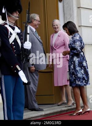 The Danish Royal Couple, Queen Margrethe and Prince Consort Henrik, welcom first lady Michelle Obama to lunch at the Amalienborg Palace in Copenhagen. Stock Photo