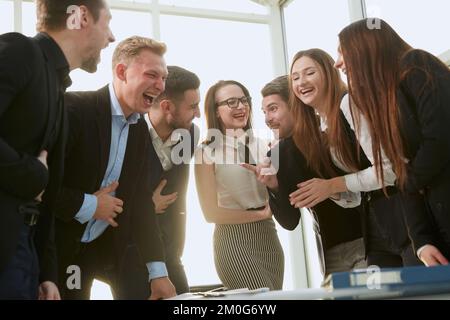 working group is discussing new ideas near your desktop. Stock Photo