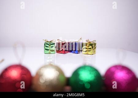 Small gift boxes, the Christmas toys isolated on white background Stock Photo