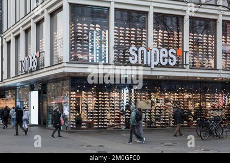 Snipes store on the shopping street Schildergasse, shop for sneaker and streetwear, Cologne, Germany. Snipes Store in der Fussgaengerzone Schildergass Stock Photo