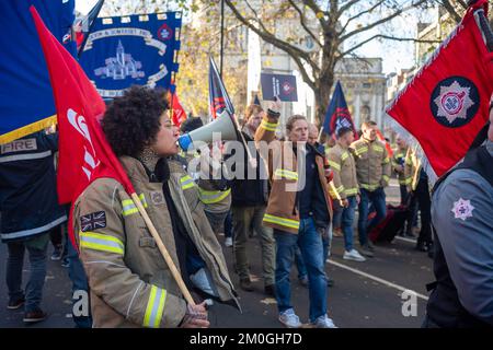 London/UK 06 Dec 2022.  FBU (Fire brigade Union) opened their strike ballot to their 32,000 members of firefighters and control staff. With a show of solidarity hundreds of firefighters then marched from their meeting to Houses of Parliament, demanding a fair pay rise. Aubrey Fagon/Live Alamy News Stock Photo