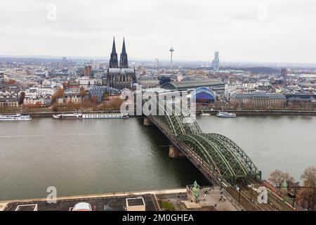 Veiw of Koln Cologne Catholic cathedral Dom and Hohenzollernbrucke over the River Rhine. From the cologne Triangle Tower, North Rhine Westfalia, Germa Stock Photo