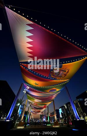 A general view of illuminated flags of competing World Cup nations, pictured in Lusail, near the Lusail Stadium, Al Daayen, Qatar. Picture date: Tuesday December 6, 2022. Stock Photo
