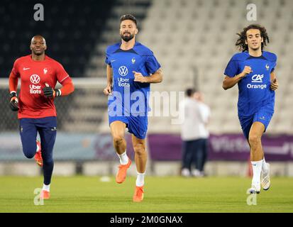 France's (left-right) goalkeeper Steve Mandanda, Olivier Giroud and Matteo Guendouzi during a training session at the Al Sadd Sports Club in Doha, Qatar. Picture date: Tuesday December 6, 2022. Stock Photo