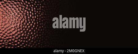 Shiny hammered copper textured surface. Orange and black color banner with space for your text Stock Photo