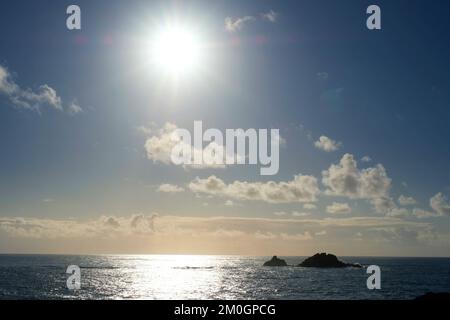 The Brisons, a group of islands off Cape Cornwall, near Lands End, Cornwall, UK - John Gollop Stock Photo