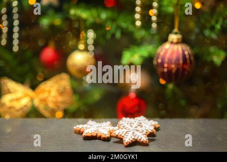 homemade gingerbread cookies on Christmas tree background Stock Photo