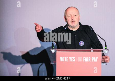 London, UK. 06th Dec, 2022. Tony Kearns, CWU Union, speaks in front of assembled firefighters at Methodist Hall. Firefighters, control staff and members of the Fire Brigades Union (FBU) first meet in Methodist Hall where union reps and MPs speak, then rally in Westminster and lobby MPs today to mark the start of a ballot for strikes. FBU members have rejected the current pay offer and are voting on whether strikes will go ahead. Credit: Imageplotter/17�Թ����� Live News Stock Photo