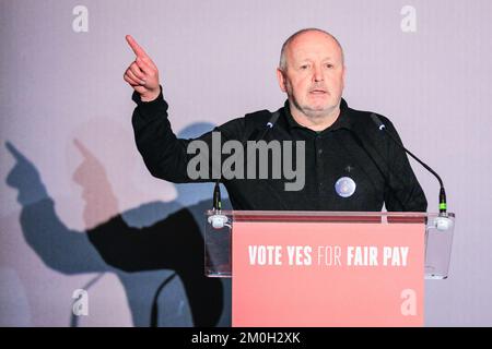 London, UK. 06th Dec, 2022. Tony Kearns, CWU Union, speaks in front of assembled firefighters at Methodist Hall. Firefighters, control staff and members of the Fire Brigades Union (FBU) first meet in Methodist Hall where union reps and MPs speak, then rally in Westminster and lobby MPs today to mark the start of a ballot for strikes. FBU members have rejected the current pay offer and are voting on whether strikes will go ahead. Credit: Imageplotter/17�Թ����� Live News Stock Photo
