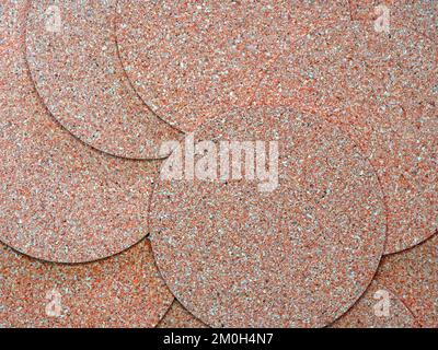 Cork coasters laid in a spiral. Meant as background Stock Photo