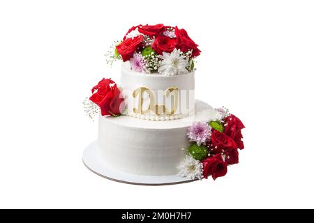 Two-tiered wedding cake on a white background. Decorated with flowers, roses, asters and letters. Stock Photo