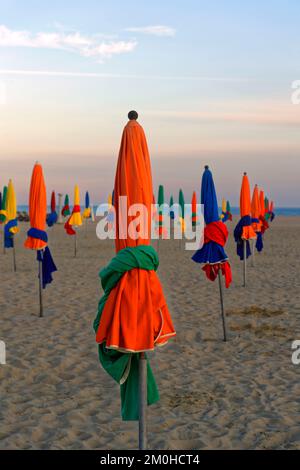 France, Calvados, Pays d' Auge, Deauville, Cote Fleurie (flowered coast), the beach and its beach unmbrellas Stock Photo