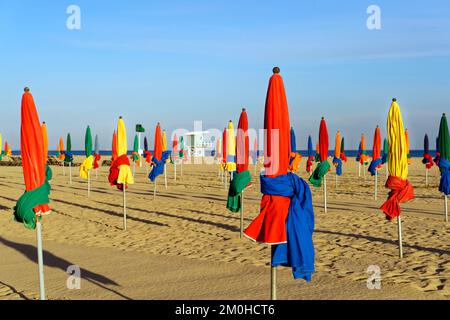 France, Calvados, Pays d' Auge, Deauville, Cote Fleurie (flowered coast), the beach and its beach unmbrellas Stock Photo