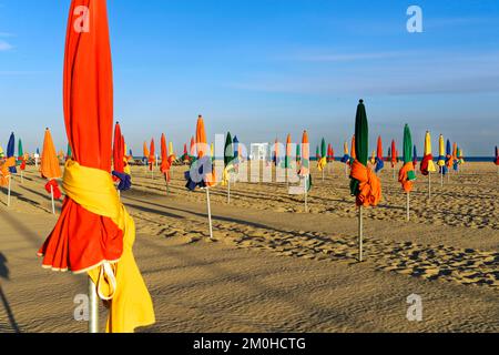 France, Calvados, Pays d' Auge, Deauville, Cote Fleurie (flowered coast), the beach and its beach unmbrellas Stock Photo