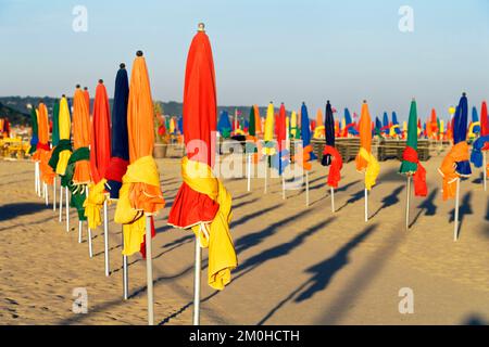 France, Calvados, Pays d' Auge, Deauville, Cote Fleurie (flowered coast), the beach and its beach unmbrellas Stock Photo