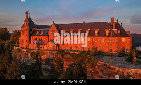 France, Bas Rhin, Mont Saint Odile, Mont Sainte-Odile Abbey also known as Hohenburg Abbey, statue of Saint Odile placed on the roof of the convent and facing the plain of Alsace (aerial view) Stock Photo