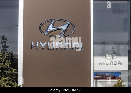 Indianapolis - Circa December 2022: Hyundai Motor Company dealership. Hyundai builds vehicles in South Korea and Montgomery, Alabama. Stock Photo