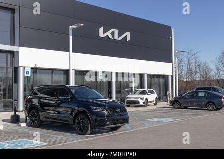 Indianapolis - Circa December 2022: Kia Motors Cars, Sedans, SUVs, and Compacts Dealership. Kia Motors is minority owned by the Hyundai Motor Company. Stock Photo