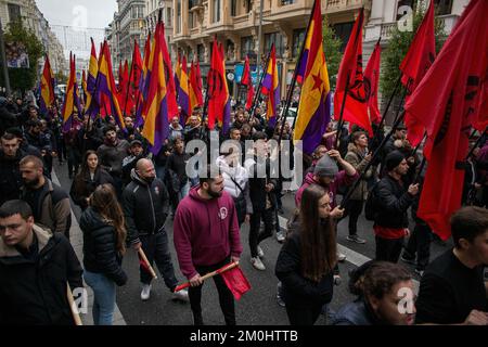 Madrid, Spain. 06th Dec, 2022. Protesters march with flags and shout slogans during the demonstration, demanding the third Republic called by the Workers' Front and Republican Space of Madrid. December 6th in Spain marks the 44th anniversary of the Spanish Constitution. Credit: SOPA Images Limited/Alamy Live News Stock Photo