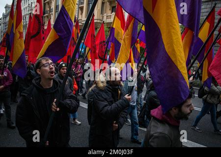 Madrid, Spain. 06th Dec, 2022. Protesters march with flags and shout slogans during the demonstration, demanding the third Republic called by the Workers' Front and Republican Space of Madrid. December 6th in Spain marks the 44th anniversary of the Spanish Constitution. (Photo by Luis Soto/SOPA Images/Sipa USA) Credit: Sipa USA/Alamy Live News Stock Photo