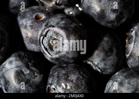 Blueberry texture as a background. A close shot of blueberries. Macro photo.blueberries. Stock Photo