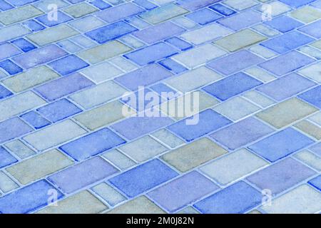 Blue stone paving slabs floor tile urban texture street road geometric pattern background. Stock Photo