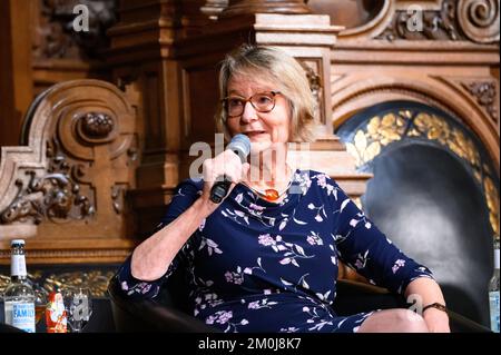 Hamburg, Germany. 06th Dec, 2022. Author Kirsten Boie on stage in the Great Festival Hall. At the invitation of the Übersee-Club, four honorary citizens of the city come together for a discussion about the future of Hamburg. Credit: Jonas Walzberg/dpa/Alamy Live News Stock Photo