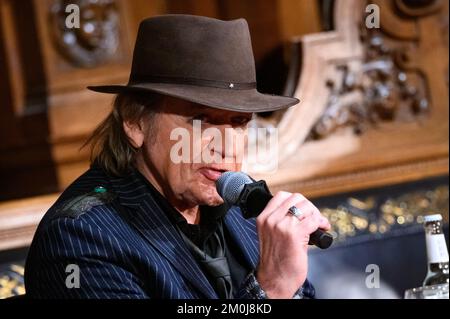 Hamburg, Germany. 06th Dec, 2022. Rock singer Udo Lindenberg on stage in the Great Festival Hall. At the invitation of the Übersee-Club, four honorary citizens of the city come together to talk about the future of Hamburg. Credit: Jonas Walzberg/dpa/Alamy Live News Stock Photo