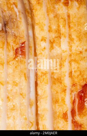 Raw bacon texture as a background. A close shot of raw bacon. Macro photo.bacon. Stock Photo