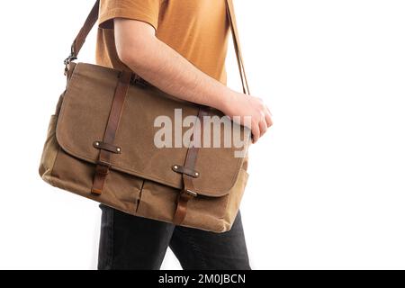 man carrying laptop bag, documents and laptop Stock Photo