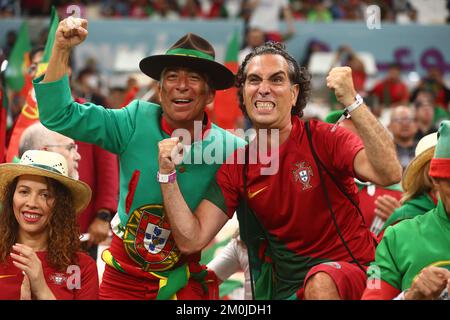 Doha, Qatar. 06th Dec, 2022. Portugal fans support their team during the 2022 FIFA World Cup Round of 16 match at Lusail Stadium in Doha, Qatar on December 06, 2022. Photo by Chris Brunskill/UPI Credit: UPI/Alamy Live News Stock Photo