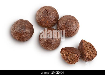 chocolate cookie with kerob, banana, cashew, sunflower seeds and coconut paste isolated on white background with full depth of field. Healthy food, gl Stock Photo