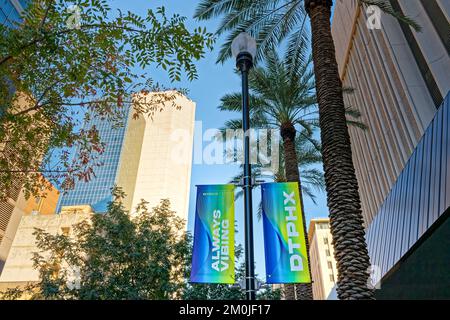Phoenix, AZ - Nov. 10, 2022: Banners on lightposts downtown say 'DTPHX' and 'Always Vibing' promoting Phoenix as Arizona's center of culture, history, Stock Photo