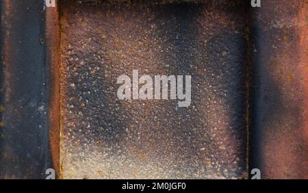 Rusty stone texture or empty brown metal surface.Dark noise from concrete walls, Broken Black Wall and floating smoke For Background Stock Photo