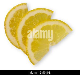 Lemon slices, three fresh half circle raw yellow citrus slices. Stock Photo