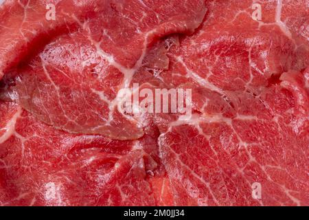 Meat for beef Carpaccio cold appetizer close up texture top view Stock Photo