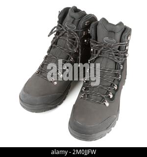 Pair of winter trekking boots isolated on white background Stock Photo