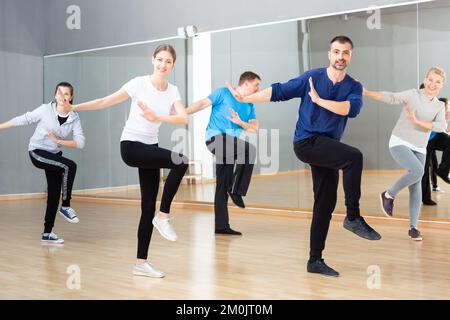 People practicing vigorous dance Stock Photo