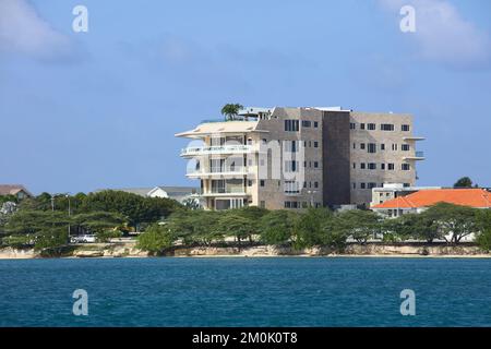 ORANJESTAD, ARUBA - DECEMBER 07, 2021: Building of luxury apartments along L.G. Smith Blvd in Oranjestad on the Caribbean island of Aruba Stock Photo
